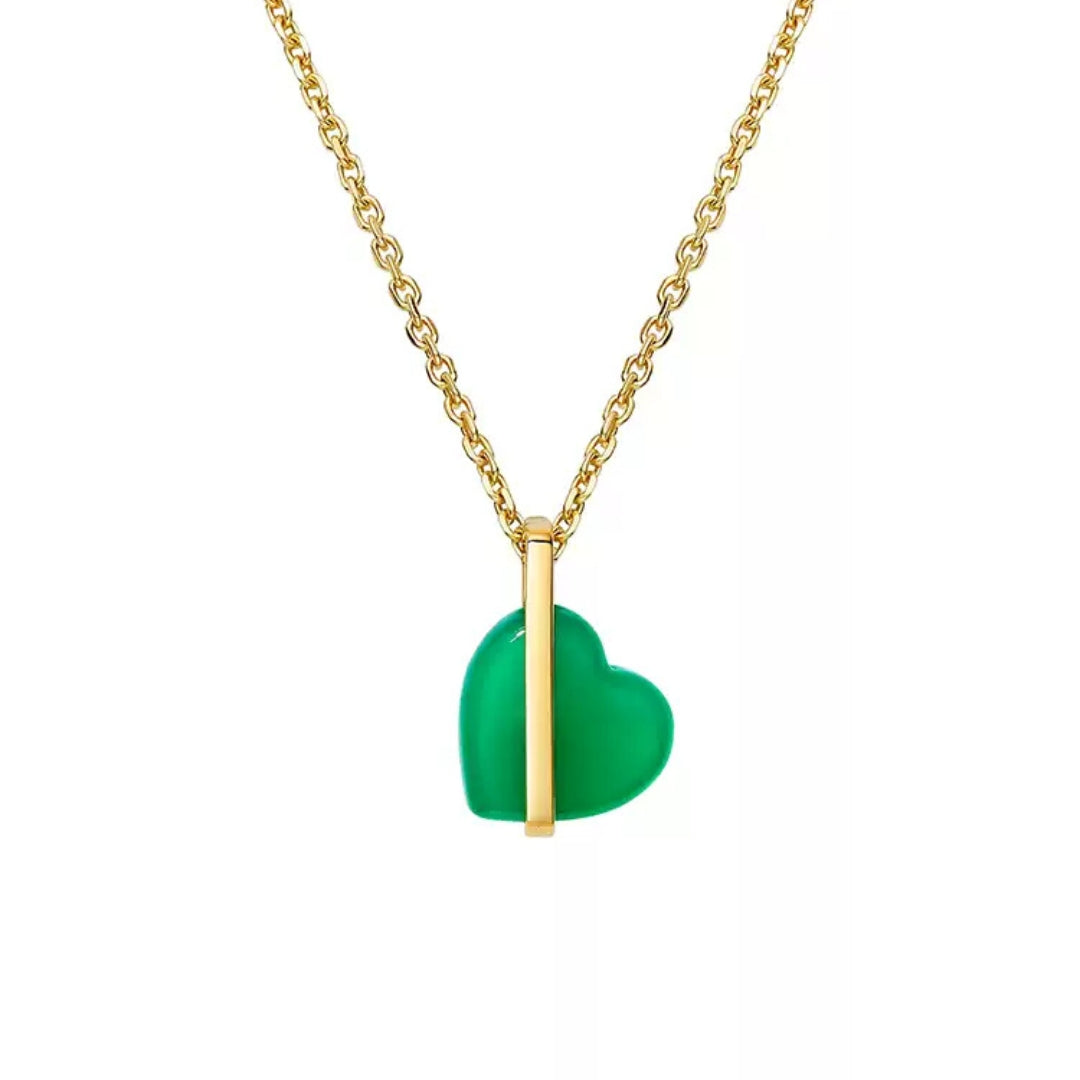 14k Gold necklace with a green heart pendant on a white background