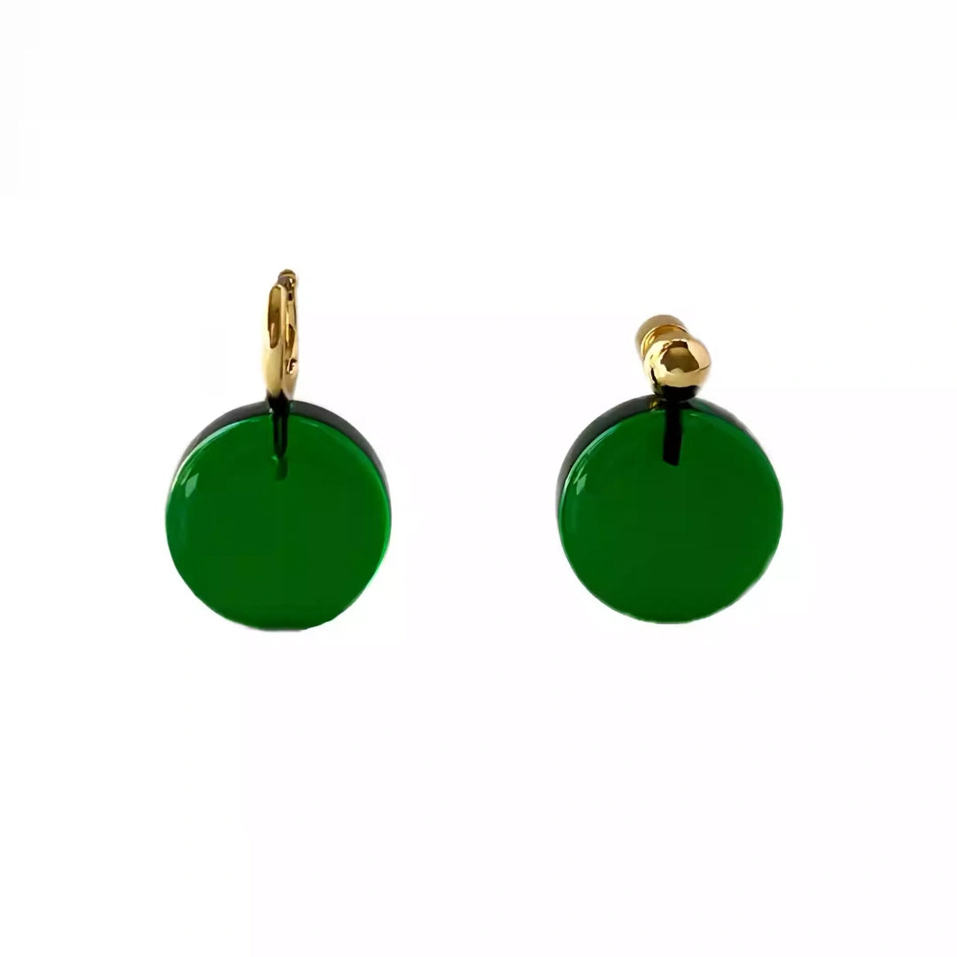 A pair of 2.5cm emerald green glass stud earrings featuring gold ball accents and hypoallergenic stainless steel pins.