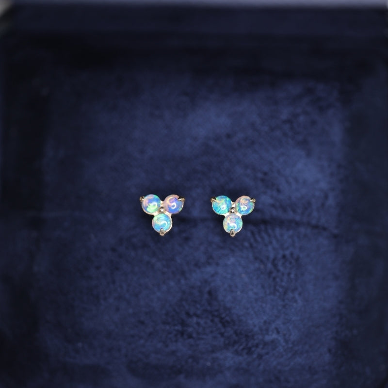 This pair of dainty stud earrings is made in solid 18K gold with genuine Australian opal gemstone, opal stone is October birth stone. 
