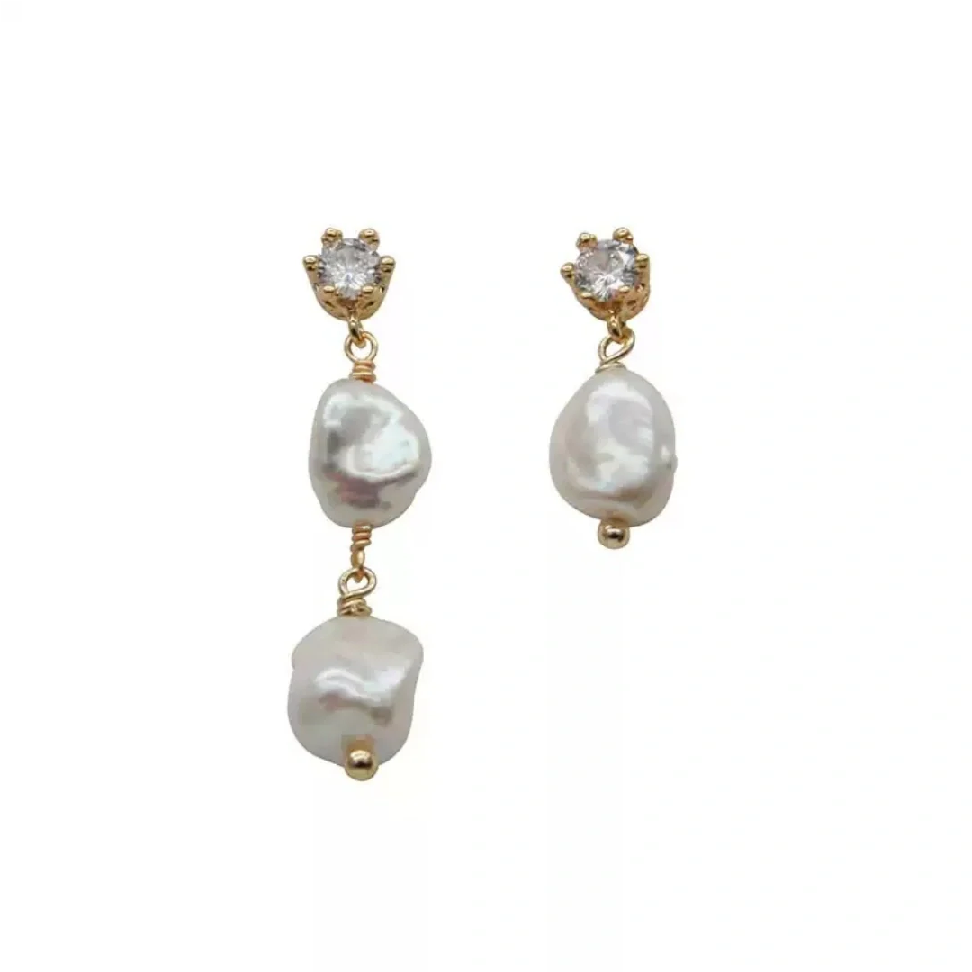 Asymmetric floating baroque freshwater pearl drop earrings showing long and short variations for a minimalist look - product-studio-2