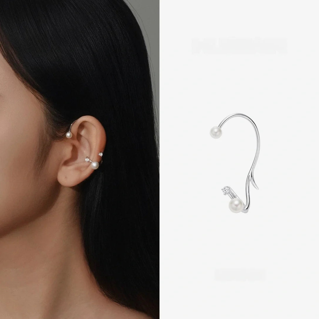 Illusion ear hook minimalist S925 silver and natural pearl crawler showcasing the asymmetric ear contour design - model-look-2