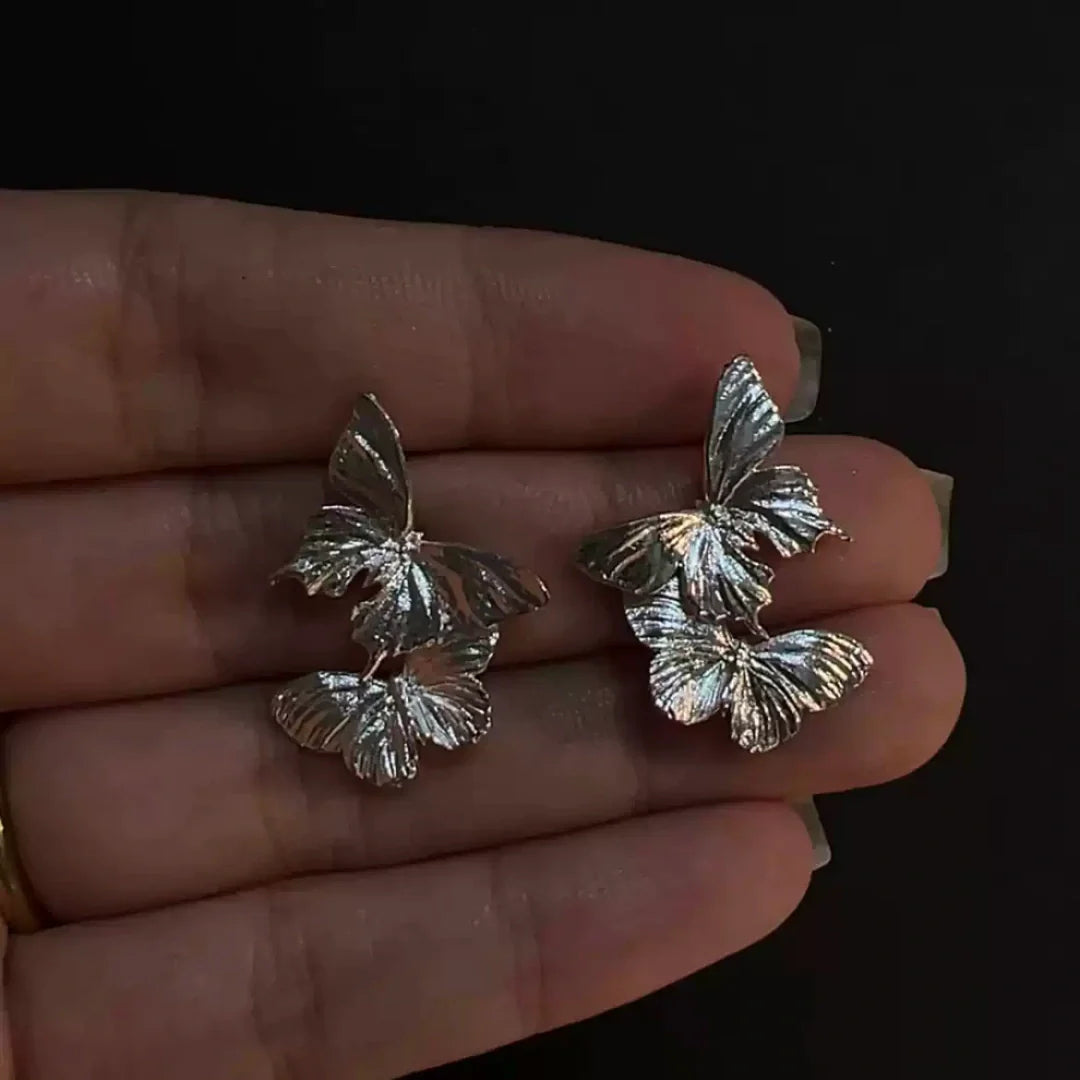 Morphic Butterfly Vintage 925 Sterling Silver double butterfly design on a dark wooden tray - product-studio-1